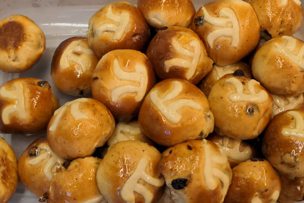 Hot cross-style buns with the pi symbol on top