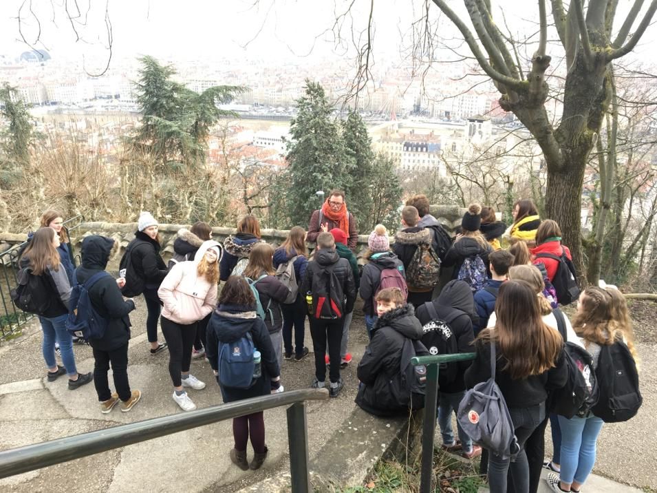 Students listening to a guide