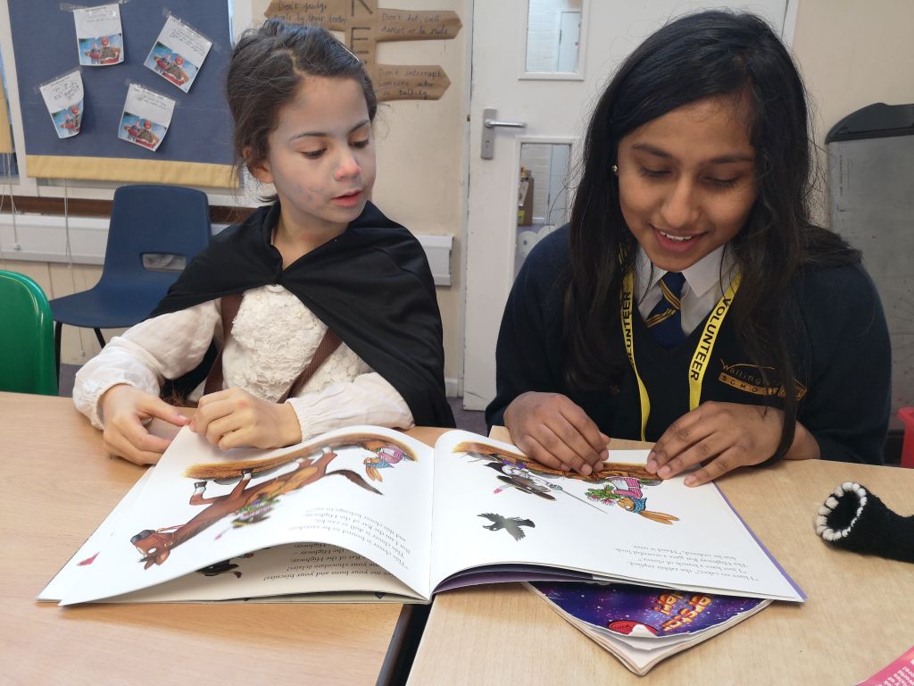 Girls reading together