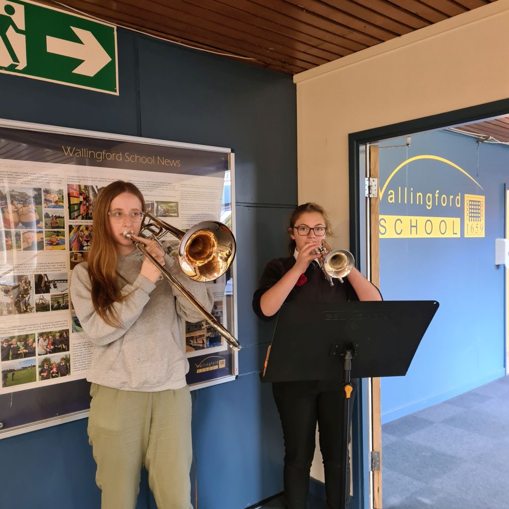Students performing The Last Post