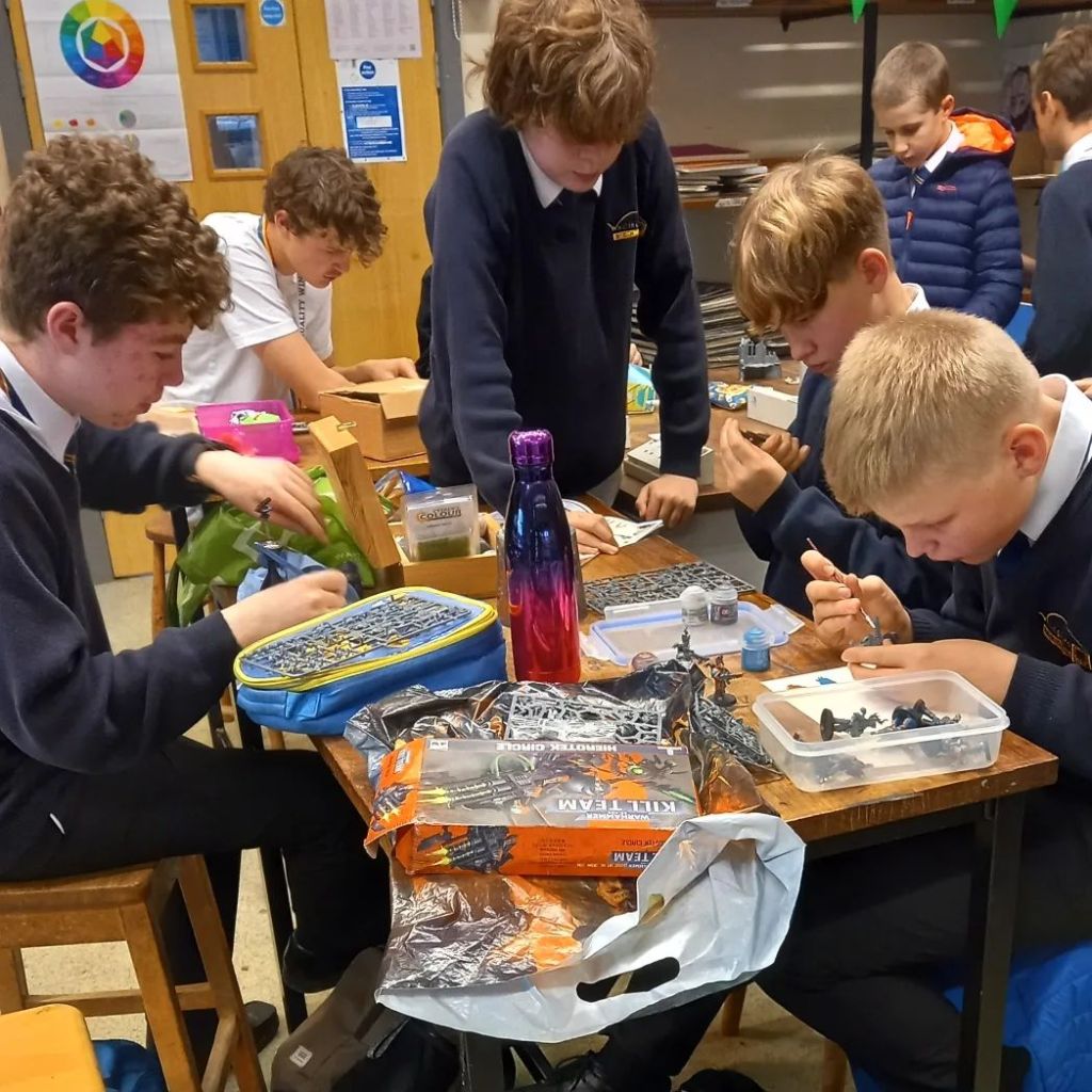 Students working on models in the Warhammer Club