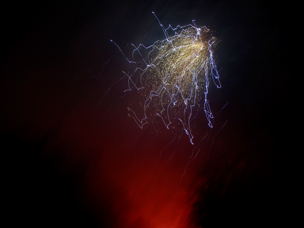 Ted Carrington-Rowlin (Year 9) - Senior 3rd Place Blue and yellow fireworks over a red glow