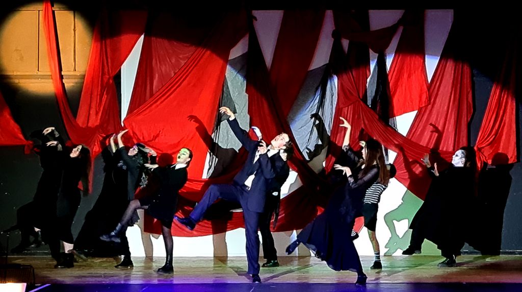 Students performing on stage