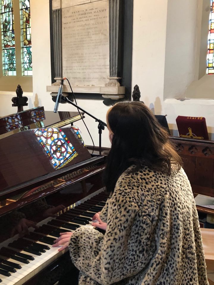 Student playing the piano