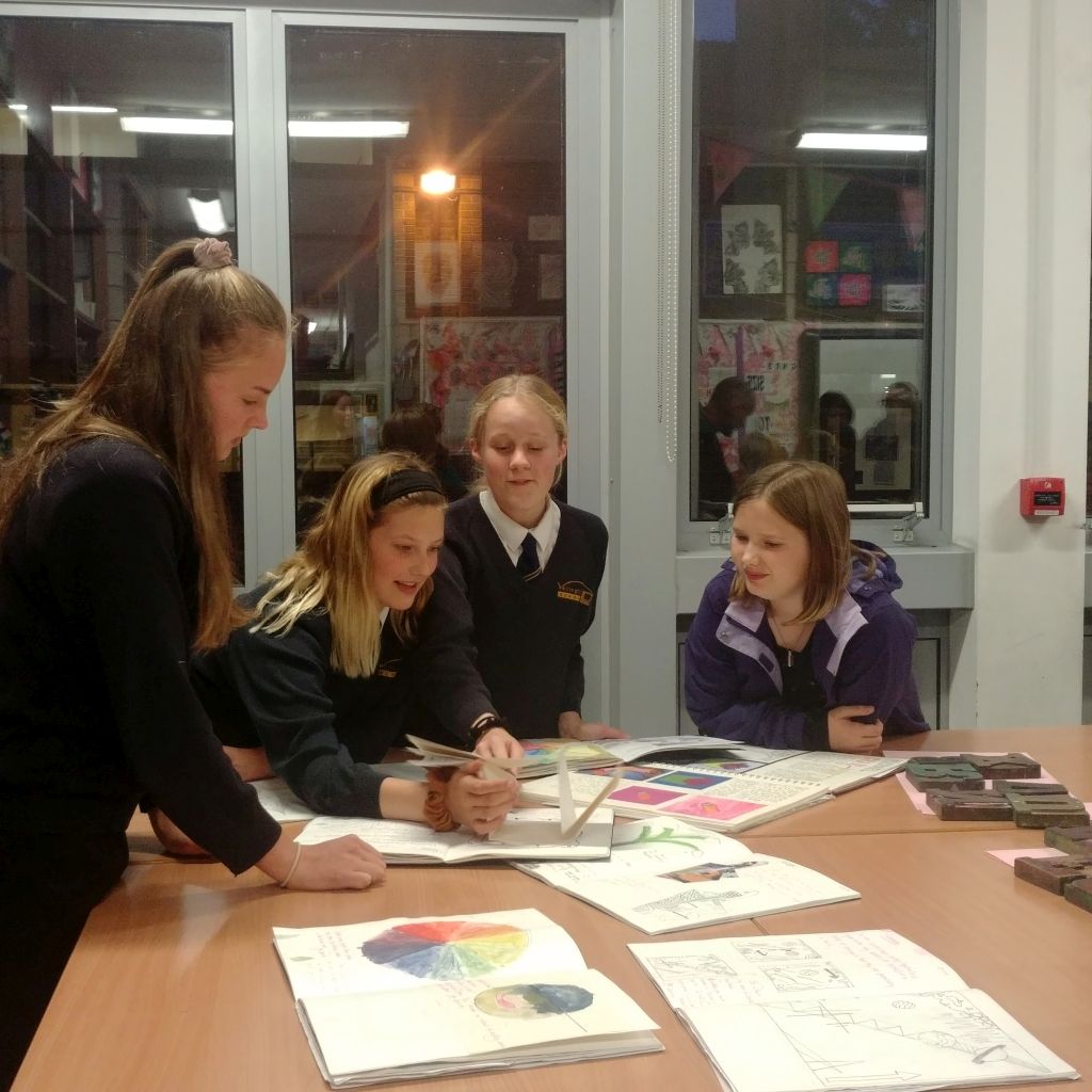 Students show work from their art books