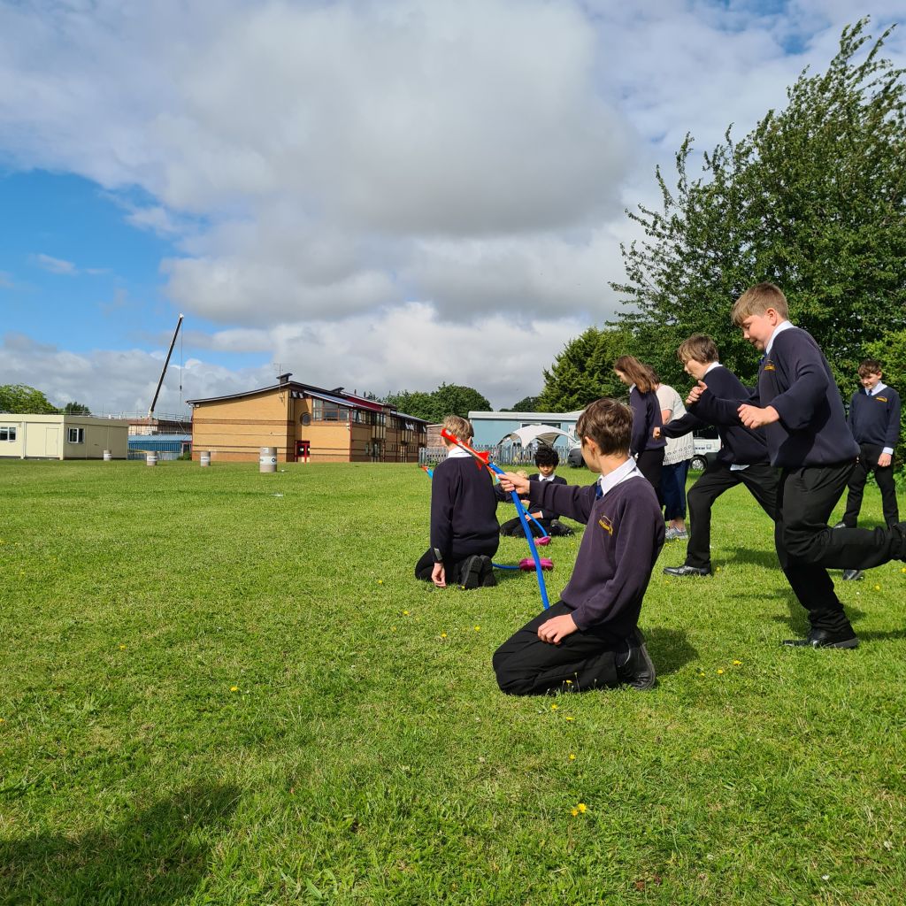 Launching air-propelled rockets